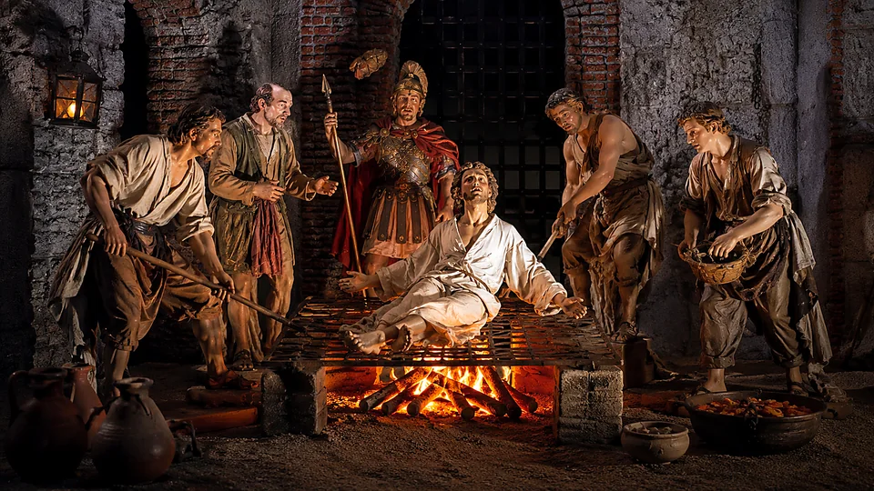 Scena presepiale con figure riunite attorno al fuoco, studiata per l'illuminazione notturna